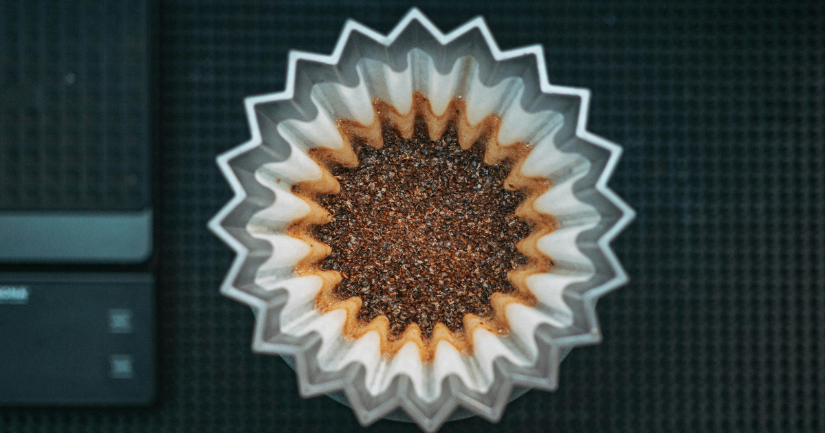 Freshly ground coffee beans for a pour over with a scale